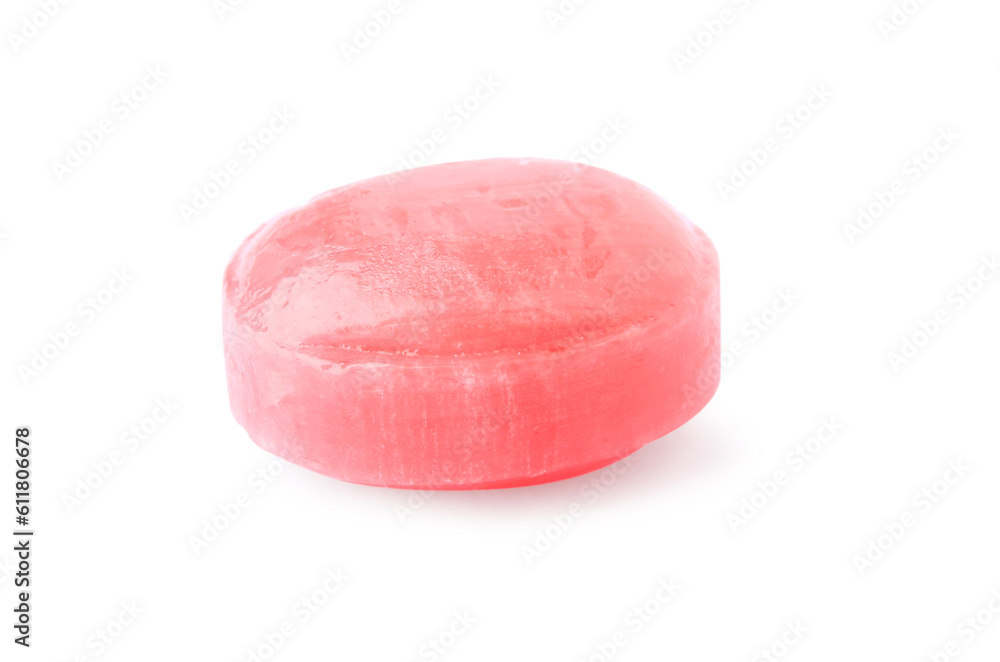 One pink cough drop isolated on white One pink cough drop isolated on white