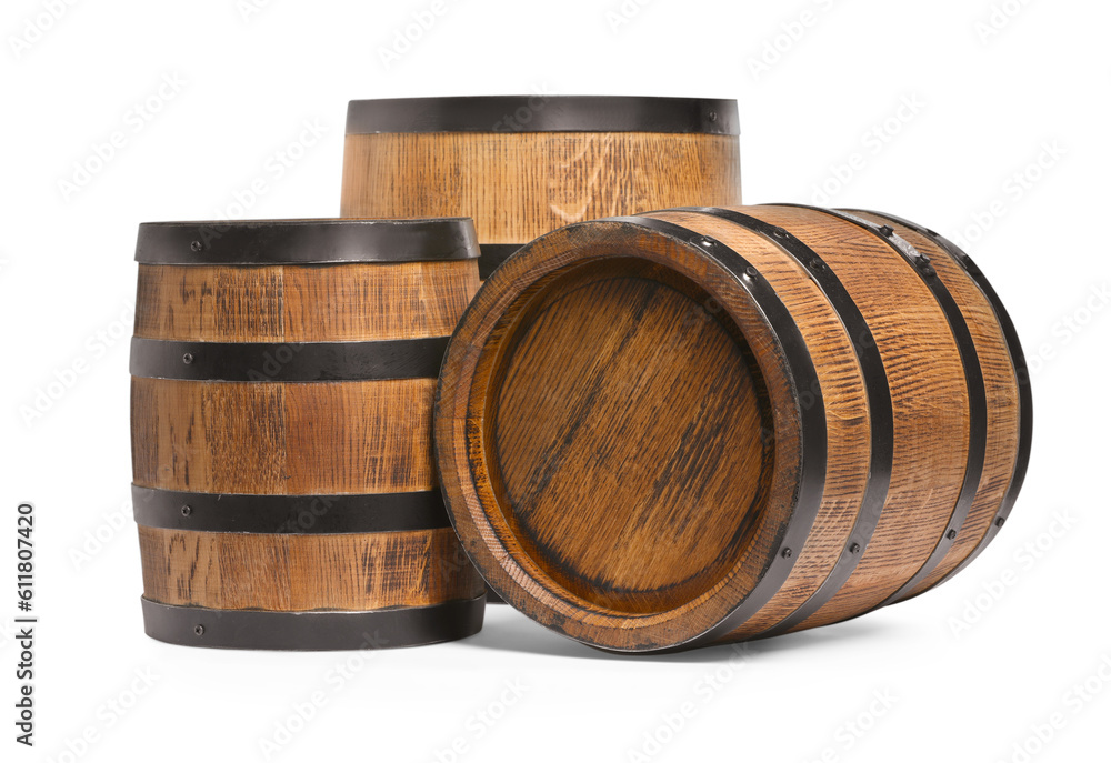Three traditional wooden barrels on white background Three traditional wooden barrels on white background