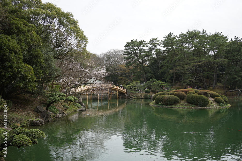 Traditional Bridge, Pond and Japanese Garden at Ritsurin Garden Park in Takamatsu, Kagawa, Japan - 日本 香川 高松 栗林公園 日本庭園 池 迎春橋 Traditional Bridge, Pond and Japanese Garden at Ritsurin Garden Park in Takamatsu, Kagawa, Japan - 日本 香川 高松 栗林公園 日本庭園 池 迎春橋