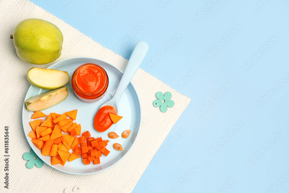 Plate with fresh apple, vegetables and jar of baby food on color background Plate with fresh apple, vegetables and jar of baby food on color background