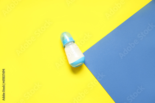 Bottle with milk for baby o...