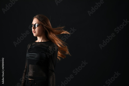Young woman in sunglasses o...