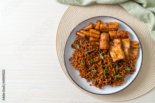 Jajangmyeon or JJajangmyeon with Odeng and Omuk - Korean Instant noodles with Korean fish cake in black bean sauce photo