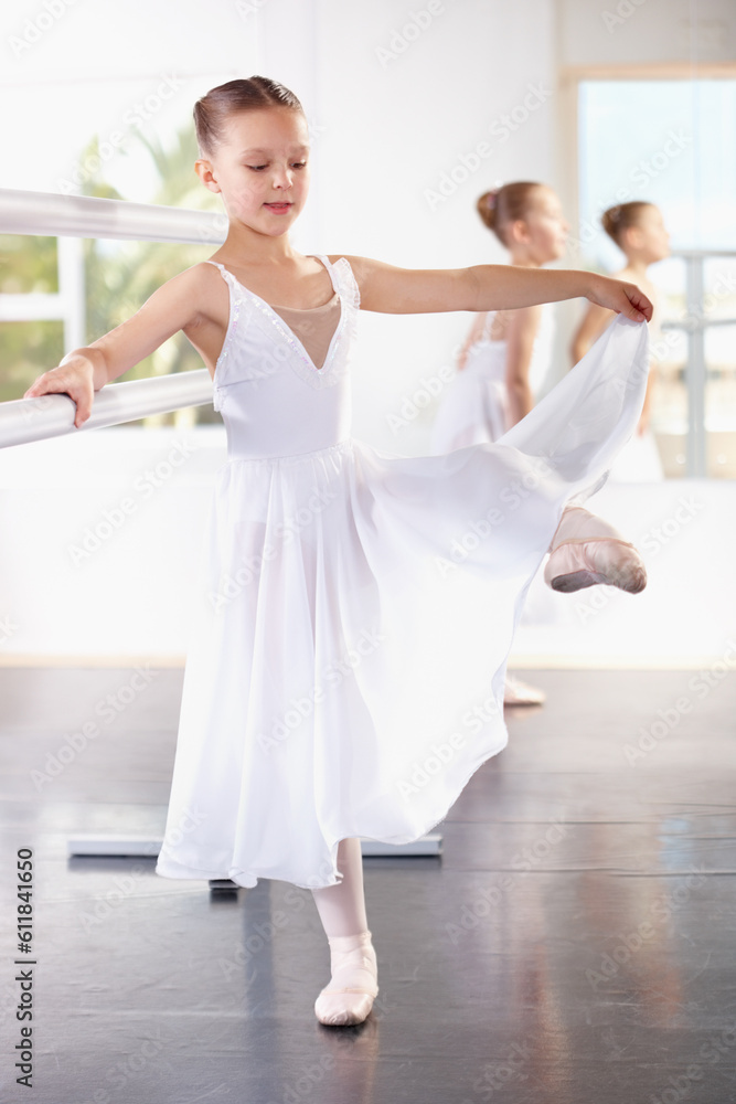 Young girl, ballet training with dancer at academy, ballerina at practice and dancing at studio. Female child learning to dance in lesson, creativity with fitness and balance, focus and concentration Young girl, ballet training with dancer at academy, ballerina at practice and dancing at studio. Female child learning to dance in lesson, creativity with fitness and balance, focus and concentration