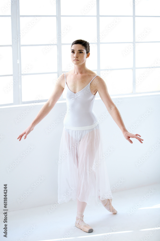Dance, ballet and focus with woman in studio for balance, elegant and performance. Artist, theatre and training with female ballerina dancing in class for competition, freedom and commitment Dance, ballet and focus with woman in studio for balance, elegant and performance. Artist, theatre and training with female ballerina dancing in class for competition, freedom and commitment