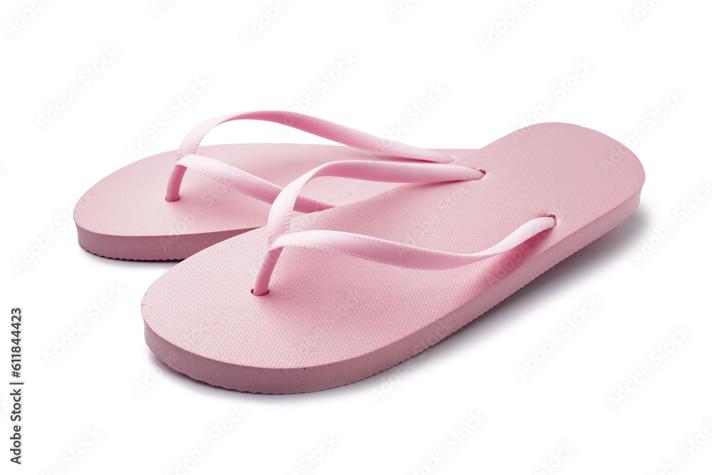 Fototapeta premium Pair of stylish pink flip-flops on white background