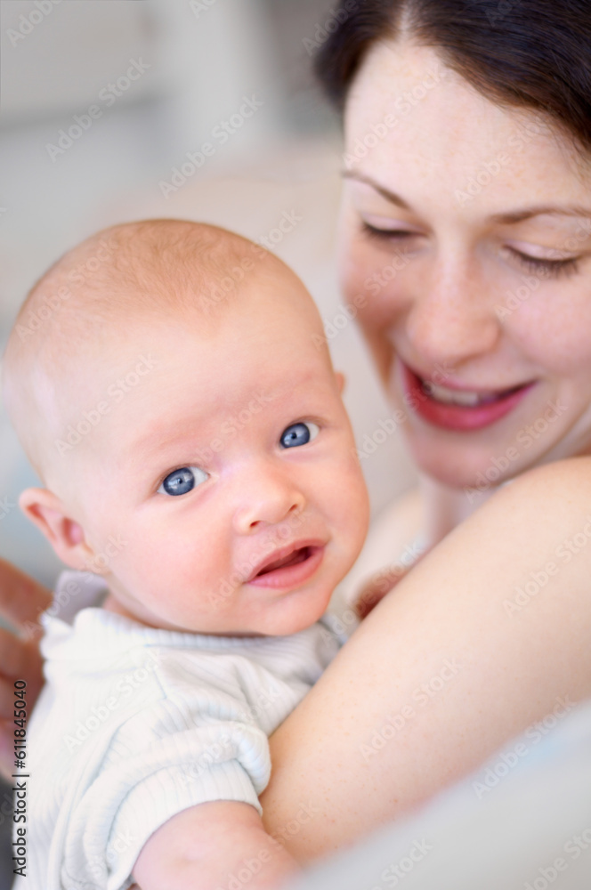 Happy, care and portrait of a mother with a baby for bonding, love and happiness. Smile, caring and a mom holding and embracing a newborn child for childcare, motherhood and parenting in a house Happy, care and portrait of a mother with a baby for bonding, love and happiness. Smile, caring and a mom holding and embracing a newborn child for childcare, motherhood and parenting in a house