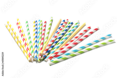 Different paper drinking straws on white background