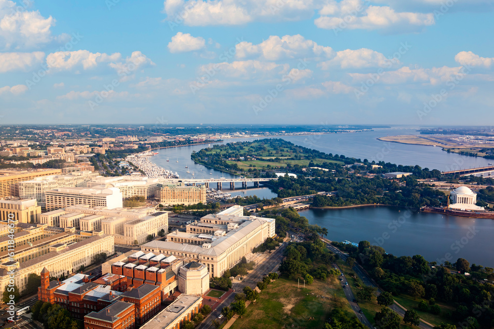 aerial of Washington with potomac river, historic government buildings and greek temple,