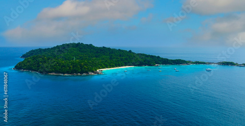 Aerial view with seashore Indian Ocean at green local island in Maldives