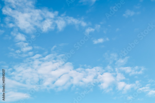 Background of blue sky with white clouds