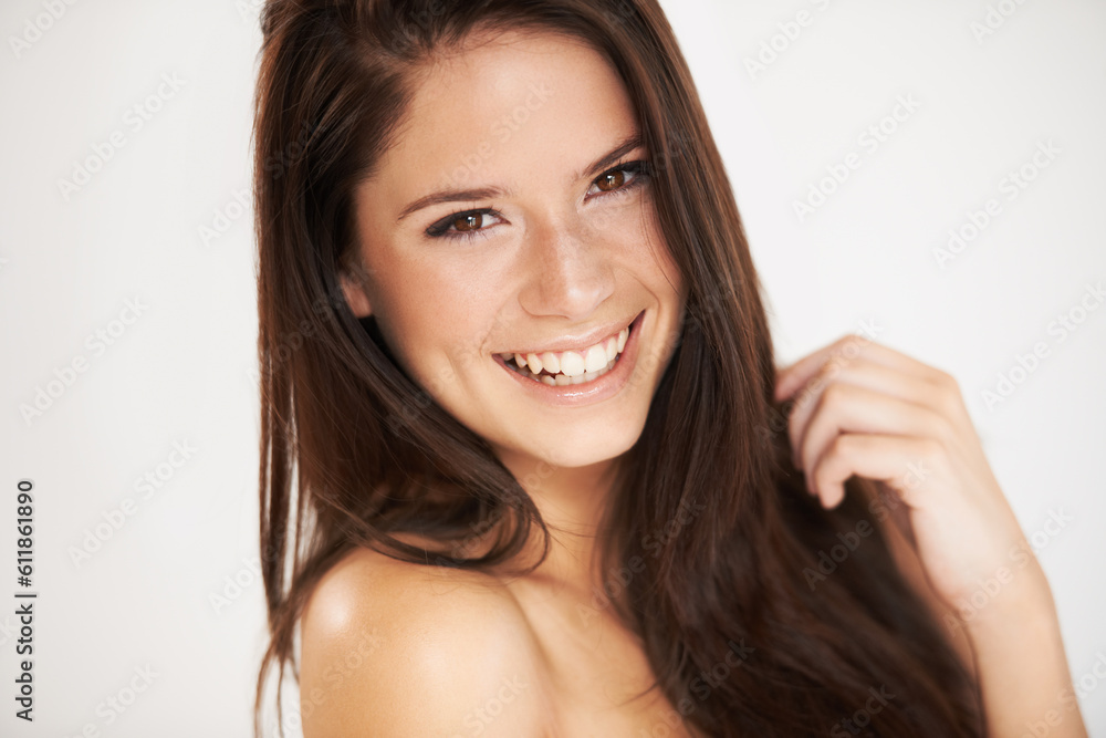 Portrait, beauty and smile with a model woman in studio on a white background for natural skincare. Face, happy and cosmetics with an attractive young female person posing for luxury skin treatment Portrait, beauty and smile with a model woman in studio on a white background for natural skincare. Face, happy and cosmetics with an attractive young female person posing for luxury skin treatment