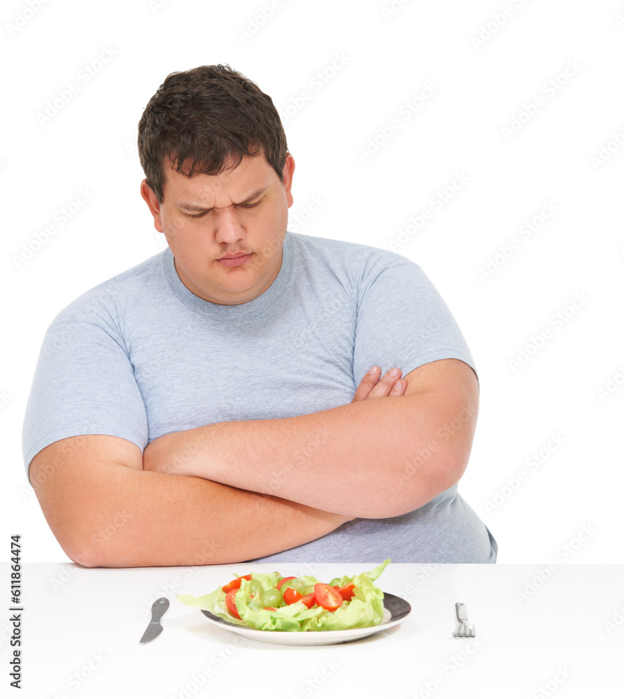 Unhappy, angry and man frustrated by healthy food, meal or salad diet isolated in a studio white background. Obesity, overweight and young man with eating problem and sad for a plate with lettuce Unhappy, angry and man frustrated by healthy food, meal or salad diet isolated in a studio white background. Obesity, overweight and young man with eating problem and sad for a plate with lettuce