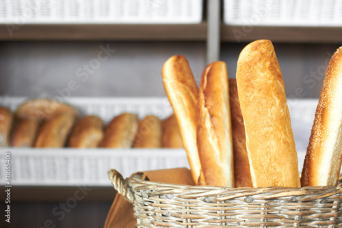 Bakery, bread basket and a supermarket or grocery store for a diet or healthy food with nutrition on a shelf. Morning, kitchen and oven baked fresh roll or product for lunch or breakfast in a shop