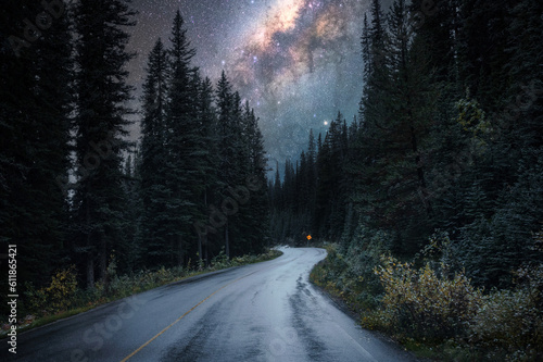 Milky way with starry over highway road in the forest at national park