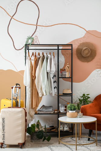 Shelving unit with clothes ...