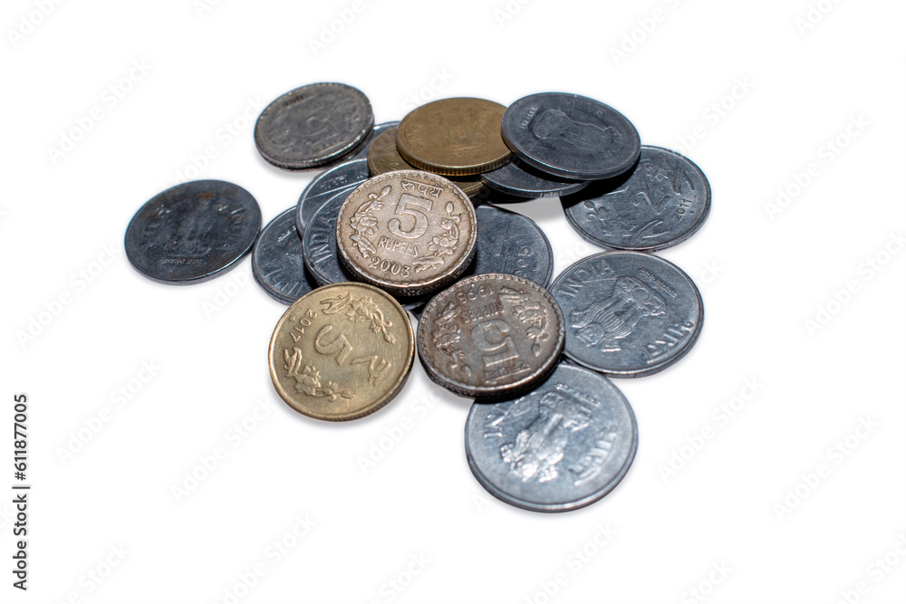 Close up of a row of Indian currency Coins, 5 rupees, 2 rupees, 1 rupee, isolated on white background Close up of a row of Indian currency Coins, 5 rupees, 2 rupees, 1 rupee, isolated on white background