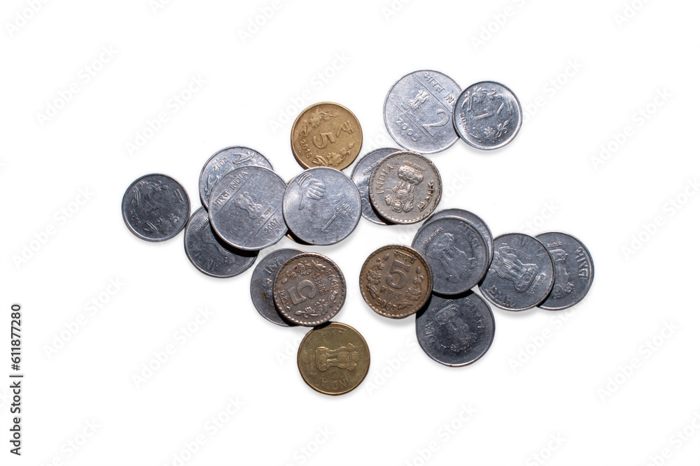 Close up of a row of Indian currency Coins, 5 rupees, 2 rupees, 1 rupee, isolated on white background Close up of a row of Indian currency Coins, 5 rupees, 2 rupees, 1 rupee, isolated on white background