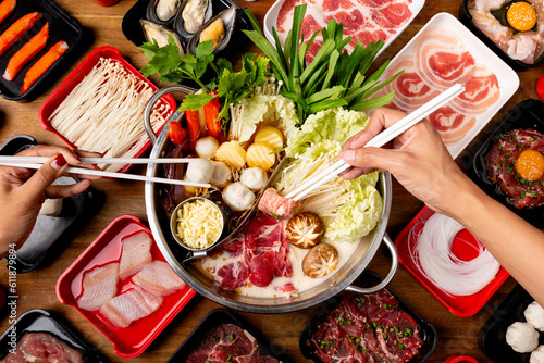 Get Your Taste with Hotpot Cuisine, Shabushi Food. Family time with buffet food photo