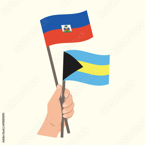 Flags of Haiti and Bahamas, Hand Holding flags