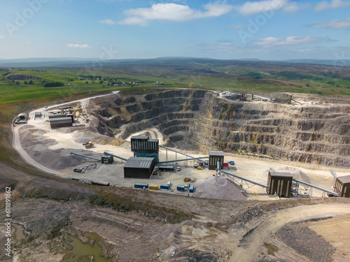 This aerial drone photo shows a large stone quarry in Yorkshire Dales National Park. This stone mine is named Coldstones Cut and is a famous landmark in this beautiful area in England. 