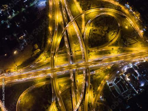 Aerial circular intersection transport city road at night with light