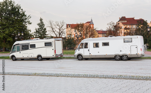 car campers traveling in city