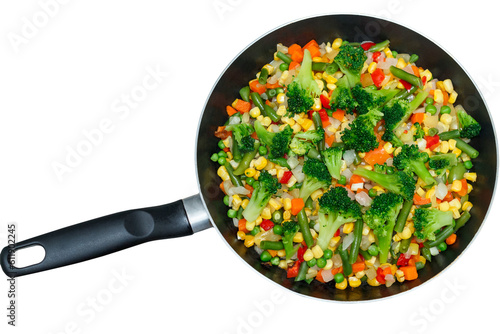Fresh vegetables in a frying pan with clipping path. Fresh products, freshly frozen odietic vegetables, broccoli, corn, asparagus, pepper, carrots Isolated on transparent background PNG file.