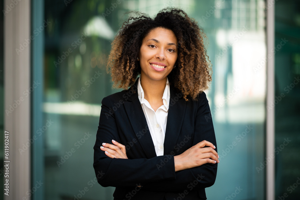 Confident young afro american female manager outdoor smiling Confident young afro american female manager outdoor smiling
