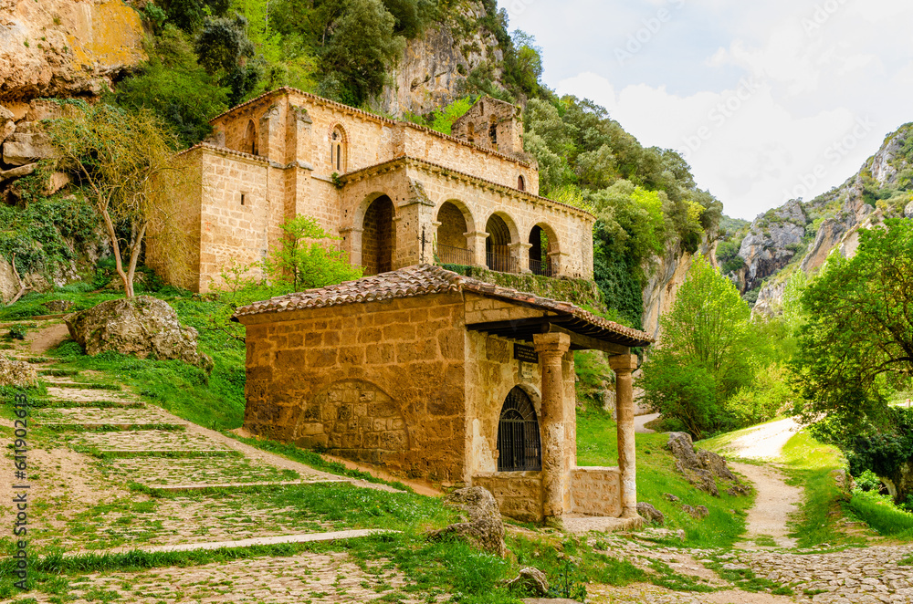 Ancient church of Santa Maria de la Hoz surrounded by nature in a middle of mountains at Tobera , near Frias - Spain. 
