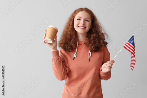 Young woman with USA flag a...