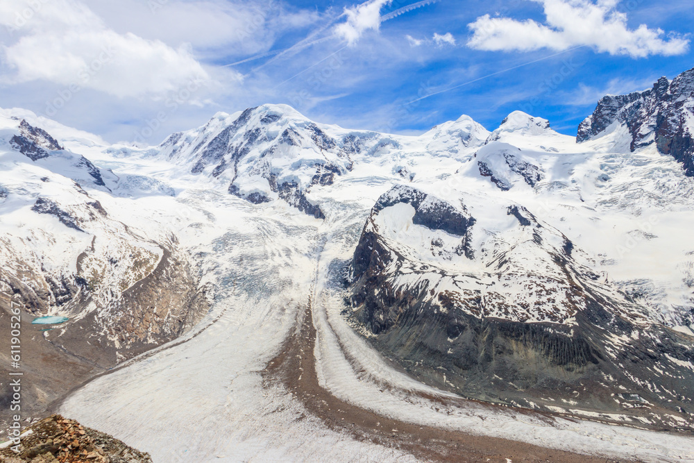 Magnificent panorama of the Pennine Alps with famous Gorner Glacier and impressive snow capped mountains Monte Rosa Massif close to Zermatt, Switzerland Magnificent panorama of the Pennine Alps with famous Gorner Glacier and impressive snow capped mountains Monte Rosa Massif close to Zermatt, Switzerland