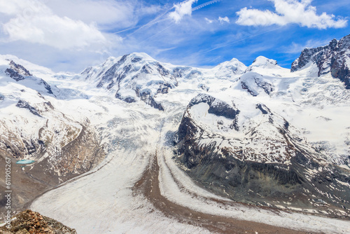 Magnificent panorama of the Pennine Alps with famous Gorner Glacier and impressive snow capped mountains Monte Rosa Massif close to Zermatt, Switzerland photo