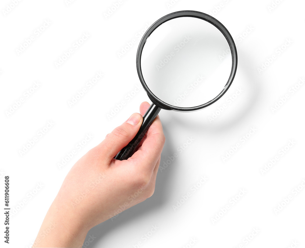 Female hand with magnifier isolated on white background Female hand with magnifier isolated on white background