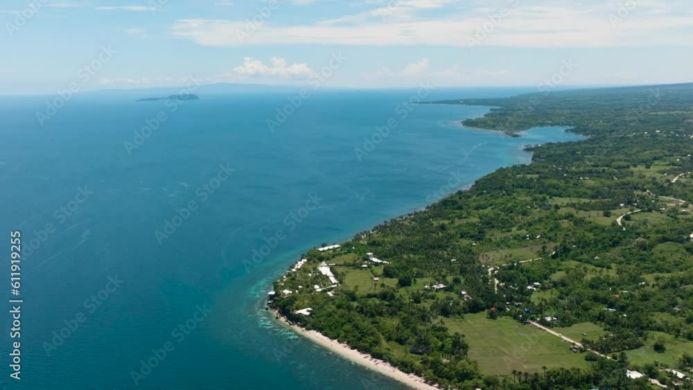 Top view of coastline of Negros island and blue sea. Seascape: Ocean and blue sky. Philippines. Top view of coastline of Negros island and blue sea. Seascape: Ocean and blue sky. Philippines.