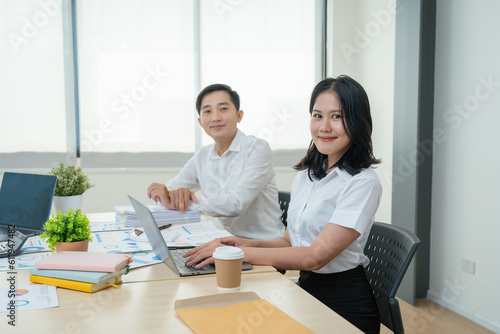 Asian business advisor meeting to analyze and discuss the situation on the financial report in the meeting room.Investment Consultant, Financial , teamwork ,brainstorming ,startup and accounting