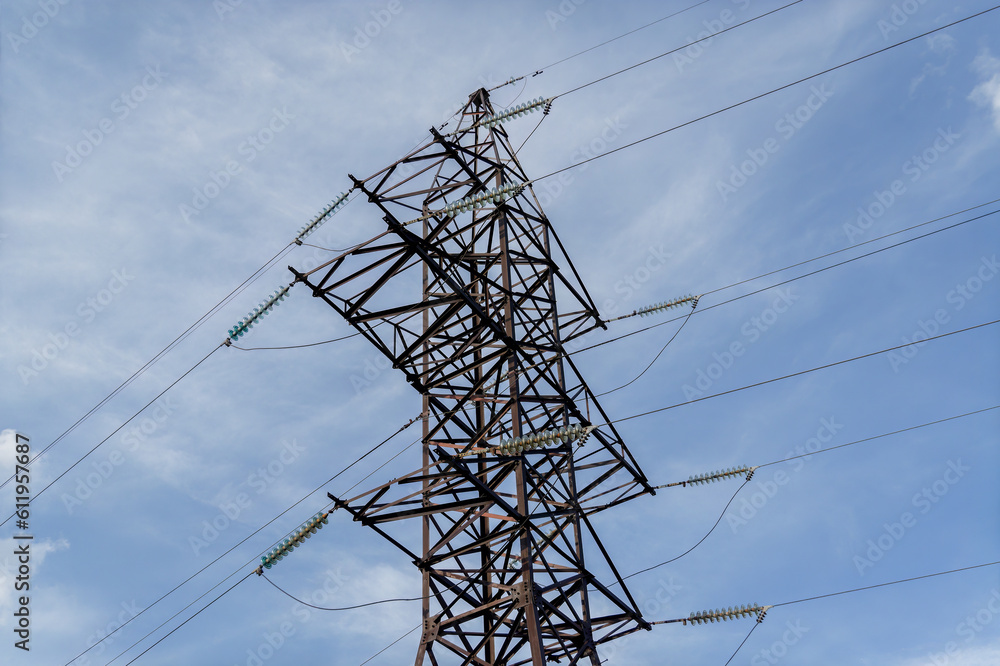 Electricity pylon against a blue sky , power transmission background. Electricity pylon against a blue sky , power transmission background.