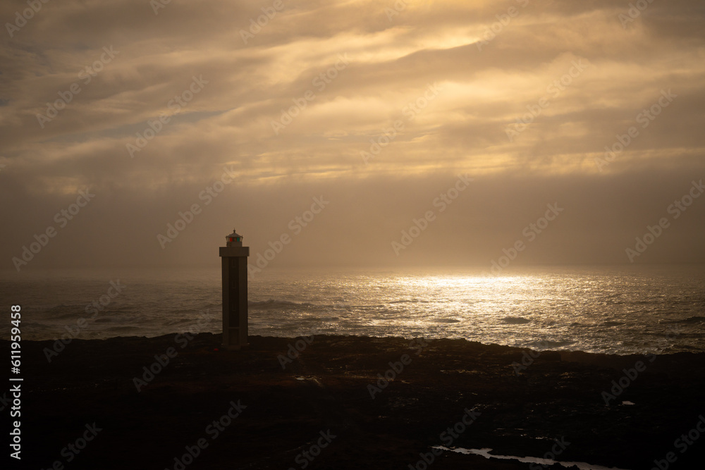 silhouette of a lighthouse