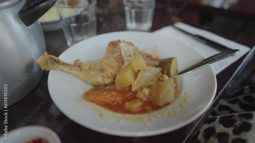 North African moroccan Chicken Dish with soup and Couscous Stock Video