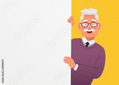 Happy elderly man with glasses looks out from behind an empty poster. A white poster for advertising.