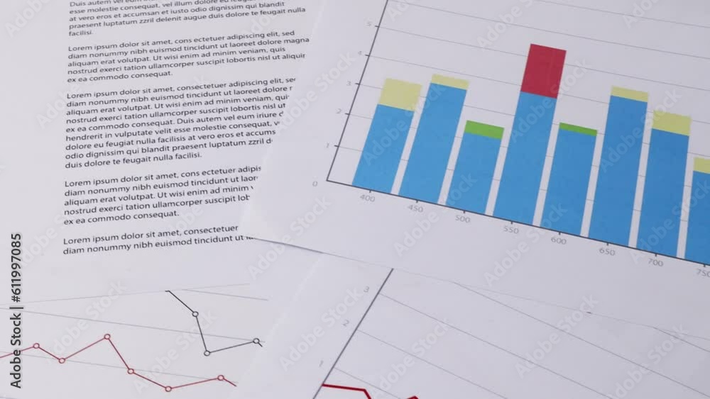 Working office place with graphs and reports.