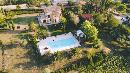 Pool Villa in Italy mediteran house at the country site drone shot