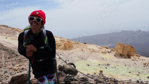 Female hiker hiking the beautiful Teide national park in Tenerife	 photo