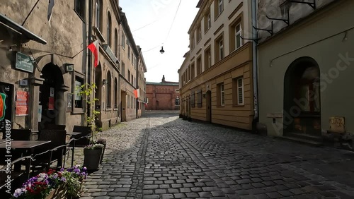 narrow and old alley in the Kazimierz district of Krakow. This district was once the center of Jewish life in Krakow and now is a vibrant cultural hub. 
