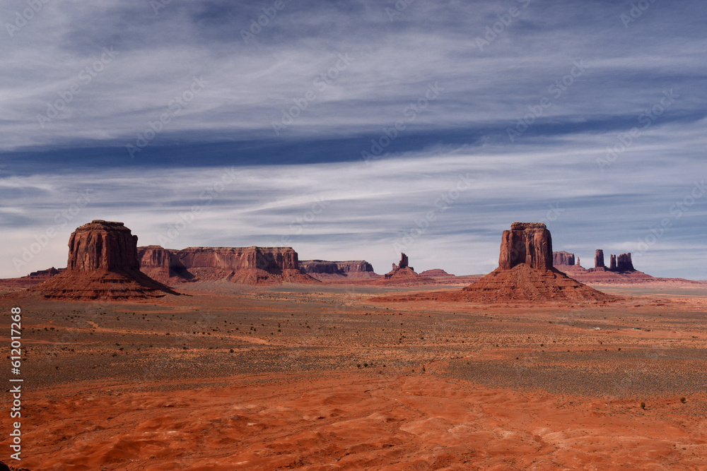 Amazing red rock formations in the Monument Valley, Navajo Tribal Park, Utah, USA. Dry dessert landscape Amazing red rock formations in the Monument Valley, Navajo Tribal Park, Utah, USA. Dry dessert landscape