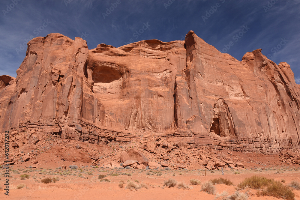 Fototapeta premium Amazing red rock formations in the Monument Valley, Navajo Tribal Park, Utah, USA. Dry dessert landscape