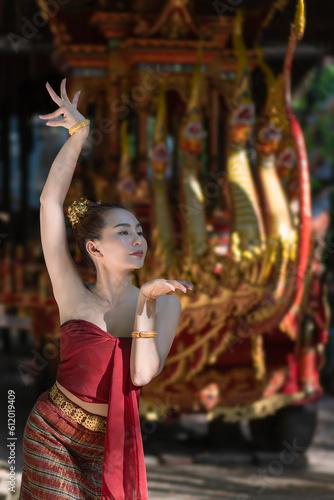 Beautiful Asian woman wearing ancient native Thai traditional dress costumes in ancient Thai dancing called Nang Ram is the noble art of elegance.