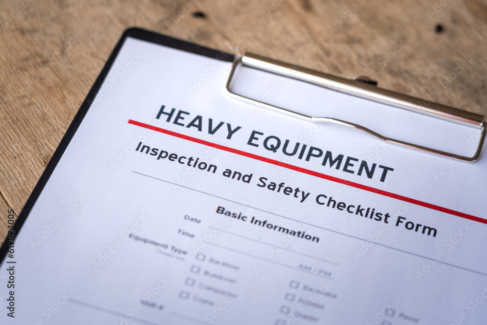 Fototapeta premium Heavy equipment checklist form using for inspect the condition of equipment before using. Industrial equipment object. Close-up and selective focus.