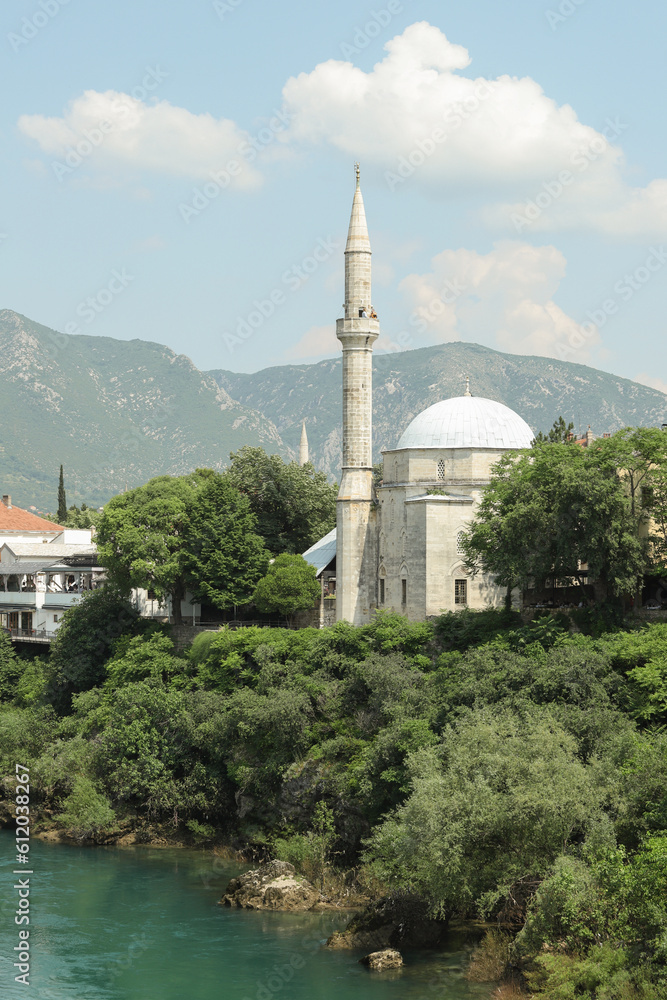 Old mosque on the river bank in Mostar in Bosnia and Hercegovina 