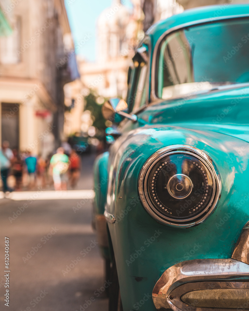 Fototapeta premium Detail of a blue car in streets of Havana